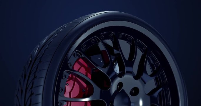 Sport car wheel rotating slowly. Cg animation with seamless loop