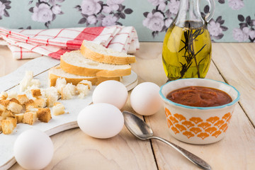 Ingredients for shirred eggs with marinara and feta.