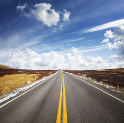 Beautiful cloudscape over mountain road, travel concept picture, Colorado, USA.