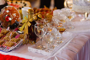 bottle of brandy and glasses