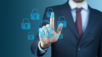 businessman hand locks in screen