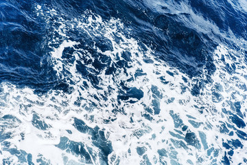 Background blue waves of the sea. Beauty world.