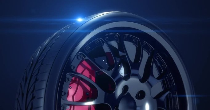 Sport car wheel rotating slowly with lens flare. Cg animation with seamless loop