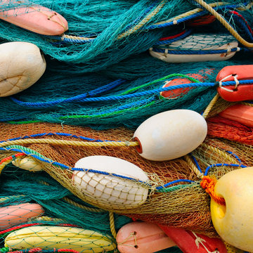 Fototapeta background of colorful fishing nets and floats