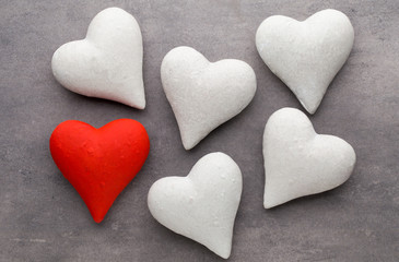 Fototapeta premium Red hearts the gray background. Valentine Day background.