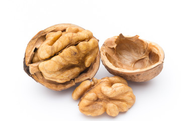 Walnut and walnut kernel isolated on the white background.
