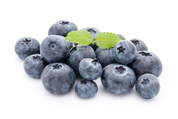 Close up of a blueberry branch isolated over white.
