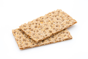 Stack of wholegrain crispy bread with sunflower, chia and sesame