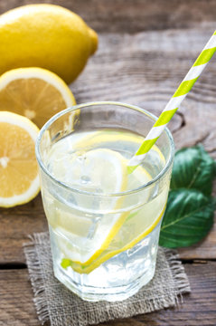 Glass of water with fresh lemon juice