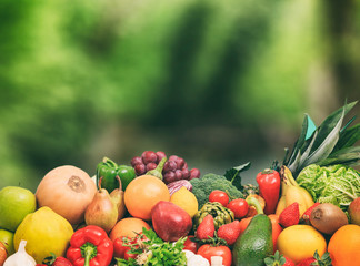 Variety of fruits and vegetables on nature background