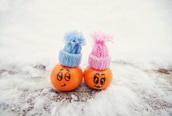funny facial expressions on the tangerines