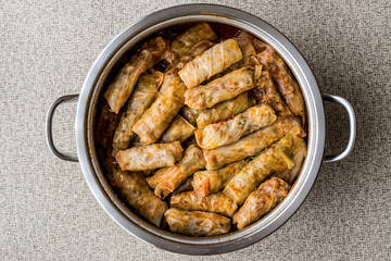 Turkish dolma Lahana Sarmasi / cabbage rolls in a pot.