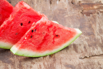 Ripe fresh watermelon on wood desk