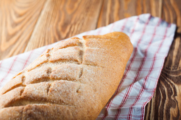 Fresh bread on wood desk.