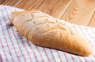 Fresh bread on wood desk.