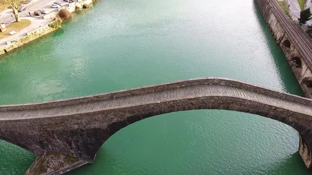 Aerial shot of famous Bridge of Mary Magdalene as known as Bridge of the Devil in Italy, 4K