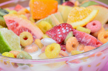 cereal with fruit in bowl on table