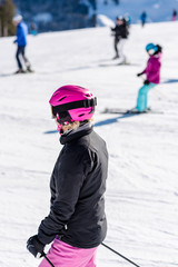 Fototapeta na wymiar Female skier in fresh snow