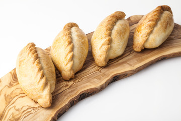 Kibinai (kybyn,kybynlar,chiburekki,pelmeni,shishlik) are traditional pastries filled with mutton and onion, popular with Karaite ethnic minority in Lithuania