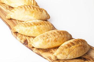 Kibinai (kybyn,kybynlar,chiburekki,pelmeni,shishlik) are traditional pastries filled with mutton and onion, popular with Karaite ethnic minority in Lithuania