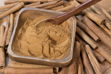 Fresh cinnamon sticks with powder