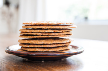 Smoothie and biscuits on a wooden table