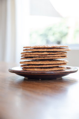 Smoothie and biscuits on a wooden table