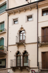 Fototapeta na wymiar The detail of the typical Italian balconies