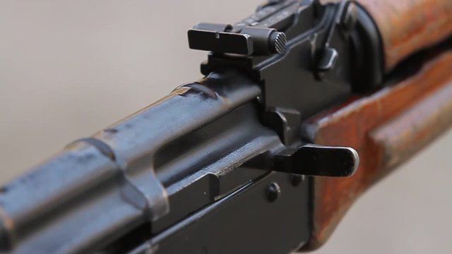 Closeup of the shutter and rear sight  Kalashnikov assault rifle, two shot.