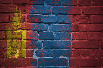 painted national flag of mongolia on a brick wall