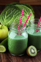 Healthy green smoothie and ingredients - superfoods, detox, diet