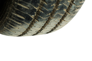 Close up on a tire on a dark background

