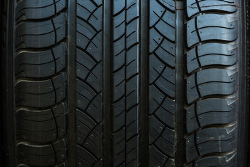 Close up on a tire on a dark background
