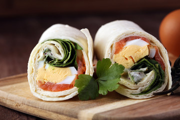 egg cheese and salomon sandwich wrap in tortilla