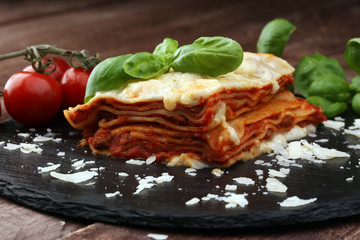 Serving of spicy traditional Italian beef lasagne in a restauran