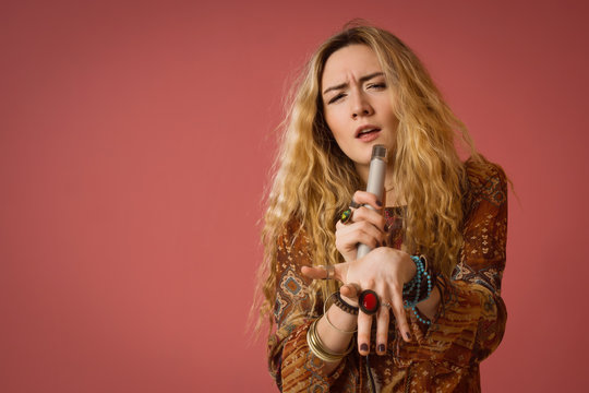 Rock star singing into a microphone
