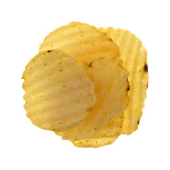Top view of several wavy potato chips isolated on a white background.