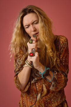 Rock star singing into a microphone