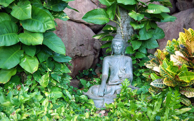 Buddha in tropical garden