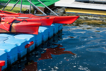 Fototapeta na wymiar a pair of single kayaks in a row 03