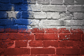 painted national flag of chile on a brick wall