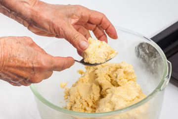 Pandebono preparation :  Form pandebono dough into medium sized balls