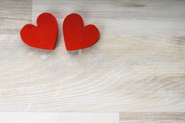 Fototapeta premium two hearts on white wooden background