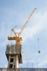 Fototapeta na wymiar Construcktion site and crane.
