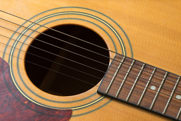 Obraz premium Guitar hole and strings, close up on