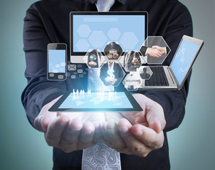 Technology in  hands of businessmen