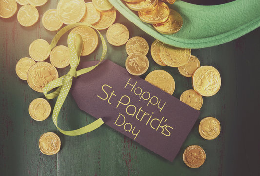 Happy St Patricks Day leprechaun hat with gold chocolate coins