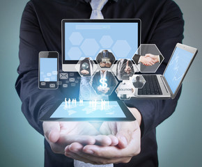 Technology in  hands of businessmen