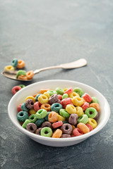 Fruit colorful sweet cereals in a bowl