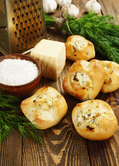 Baked buns stuffed with cheese and herbs